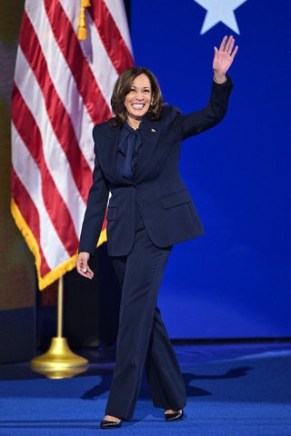 Image may contain Kamala Harris Adult Person Flag Clothing Footwear Shoe Accessories Bracelet Jewelry and People