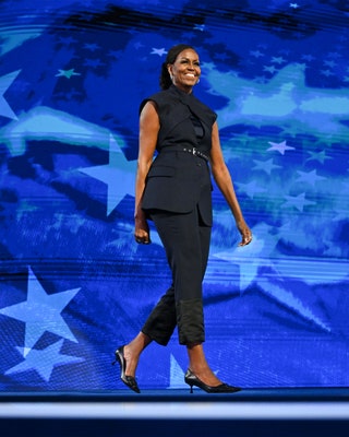 Image may contain Michelle Obama Clothing Footwear High Heel Shoe Adult Person Performer and Solo Performance