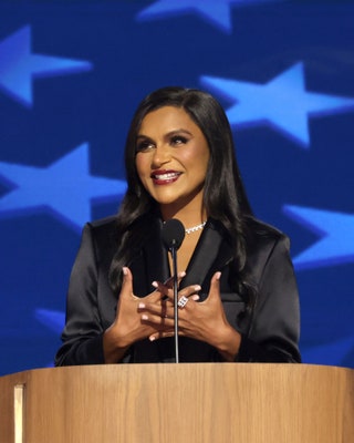 Image may contain Mindy Kaling Adult Person Electrical Device Microphone Accessories Jewelry Ring and Necklace