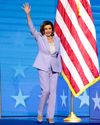 Image may contain Nancy Pelosi Clothing Footwear High Heel Shoe Flag Adult Person Accessories Jewelry and Necklace