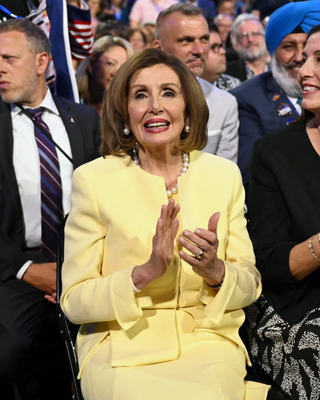 Image may contain Nancy Pelosi Kapil Srivastava Adult Person Wedding Face Head Accessories Formal Wear and Tie